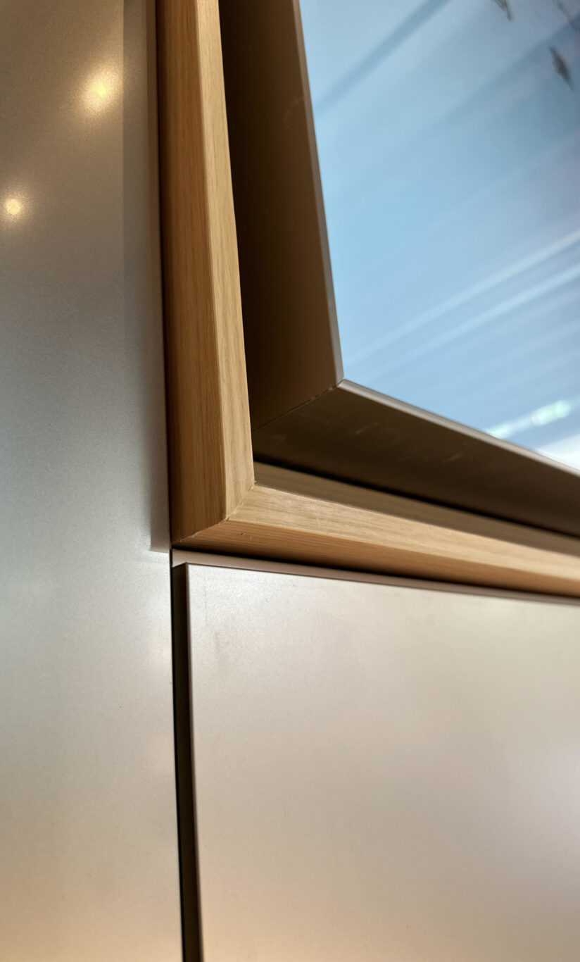 Close-up shot of a beautiful display frame mounted on a wall inside the Yau Shing commercial centre by Studio X